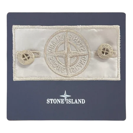 Angled view showing beige badge texture