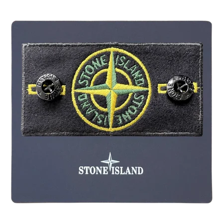 Classic Stone Island badge representing our commitment to authenticity