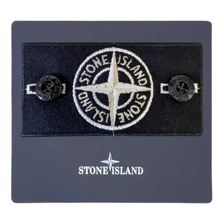 Rear view of silver badge structure