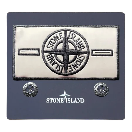 Rear view of white thermal badge