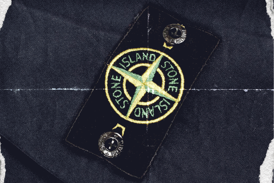 Stone Island badge shown flat on dark cloth for real-vs-fake comparison